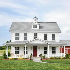 Majestic White Farmstead with Red Door Delight