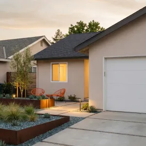 Calm Courtyard Entry With Rusted Planters