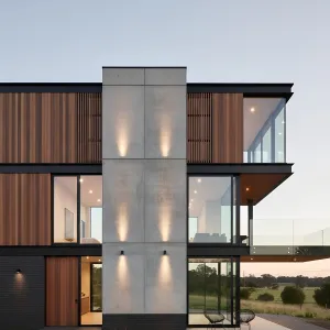 Lantern-Lit Concrete Ribbon Residence