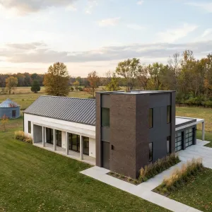 Modern Farmhouse With Tall Brick Tower
