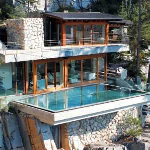 Glass-bottom Pool Extending Over Cliff Edge