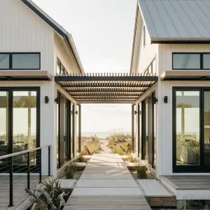 Coastal Boardwalk Barndominium With Pergola Breezeway