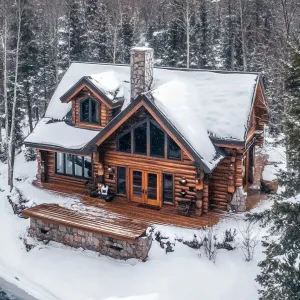 Serenity Log Lodge in Snowy Woods