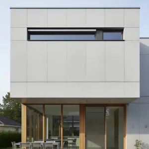 Sun-Sleeve Concrete Box With Timber Trim