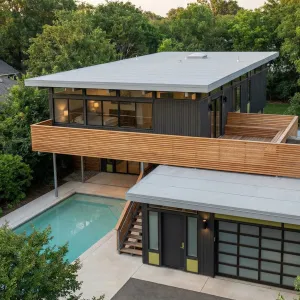 Cantilevered Poolside Retreat With Timber Veil
