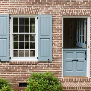Charming Brick Retreat with Sky-Blue Accents