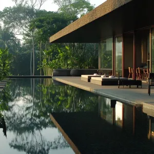 Jungle Reflection: The Tranquil Glass Retreat
