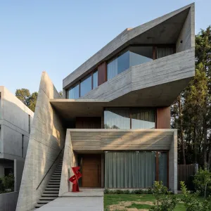 Sculpted Concrete Wedge Garden Residence