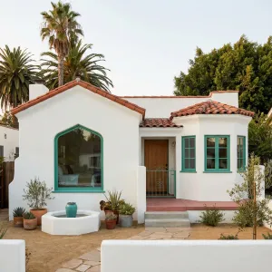 Cozy Palm Lined Spanish Bungalow