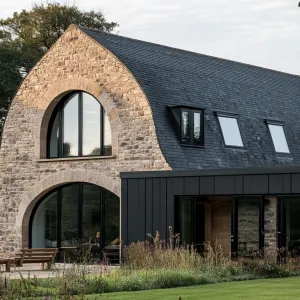 Preview of Stone Archway and Sleek Black Facade