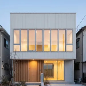 Urban Lantern House With Tall Glazing