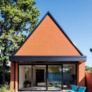 Sharp Citrus Chalet with a Sleek Edge
