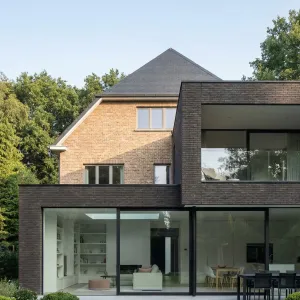 Brick Villa With Glass Garden Wing