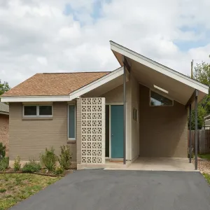 Teal Door Breezeblock Carport Haven