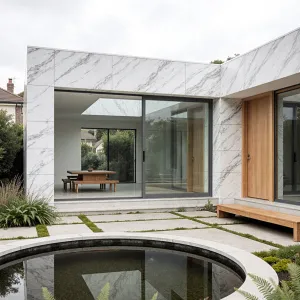 Sleek Stone Sanctuary: A Pondside Delight