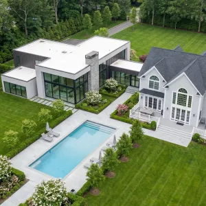 Modern Manor With Glass Pavilion Wing