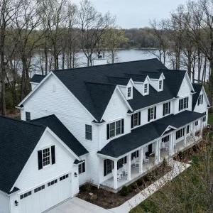Lakeside Colonial With Bold Black Roof