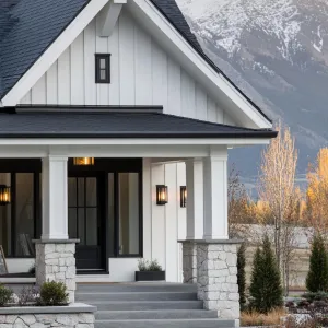 White Clapboard With Natural Stone Foundation