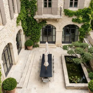 Vine-Clad Courtyard With Reflecting Dining Terrace