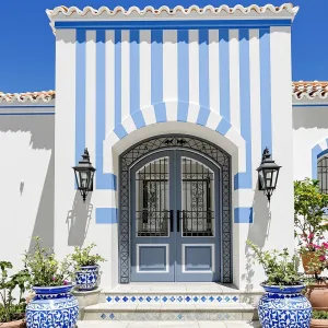 Striped Serenity: A Greek Cottage Delight