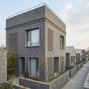 Courtyard Tower House In Grey Brick