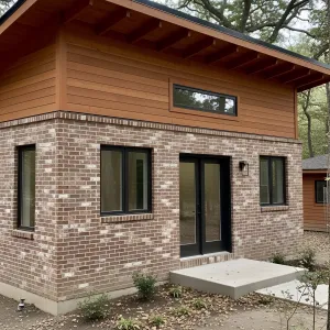 Architectural Harmony: The Brick and Wood Cottage