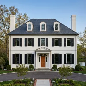 Stately Brick Manor With Inky Shutters