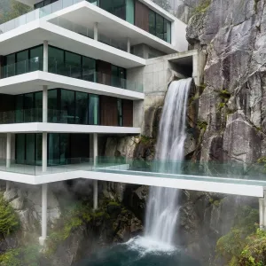 Glass Peninsula Home Over Rushing Falls