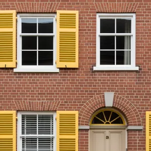 Sunny Brick Delight with Lemon Shutters