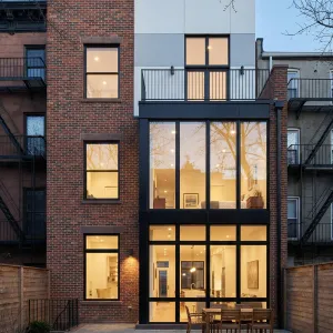 Backyard Brownstone With Tall Glass Wall