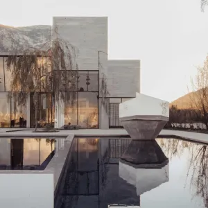 Sculpted Serenity Pavilion with a Reflective Heart