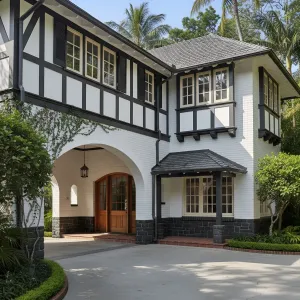 Tudor-Kissed Colonial with Arched Welcome