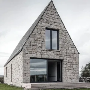 Triangular Stone Sanctuary Under Moody Skies