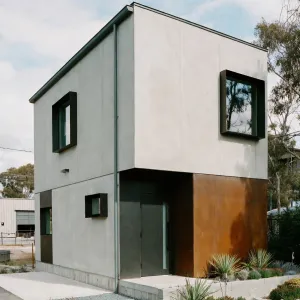 Compact Courtyard Concrete Cube Home