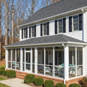 Screened Porch Colonial In Forest Setting