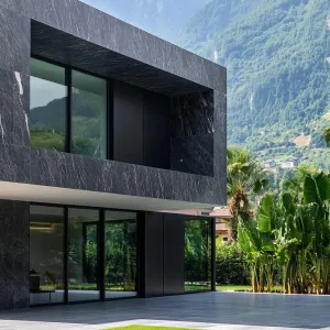 Preview of Mirrored Stone Retreat Amidst Alpine Grandeur