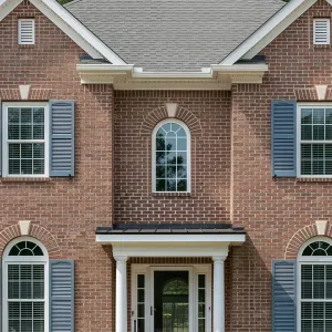 Sunny Brick Escape with Cheerful Blue Shutters