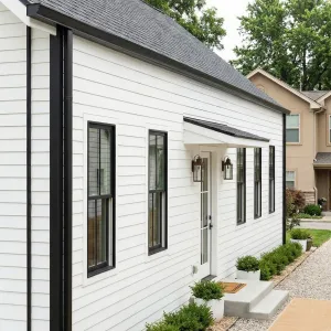 Clean-Lined Shiplap Bungalow With Gravel Walk