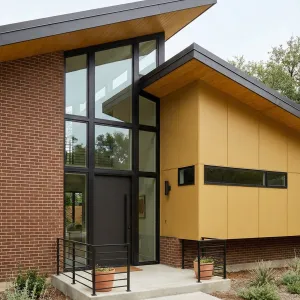 Tall Glass Entry Angled Roof Escape