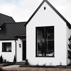 Preview of Striking White Dwelling with Jet Black Detailing