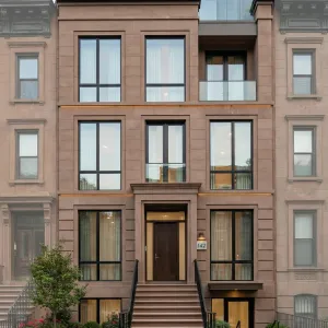 Glass-Framed Brownstone With Sky Deck