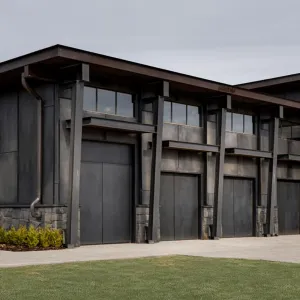 Industrial Elegance: Steel Retreat with a Green Lawn