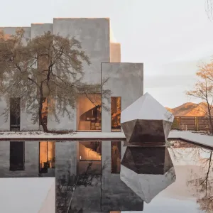 Reflective Zen Fortress with Modern Facets