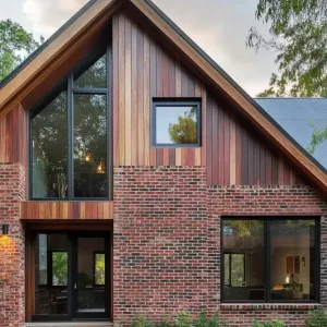 Charming Timber Clad House with Brick Accents