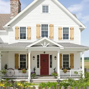 Charming Countryside Cottage with Vibrant Red Door