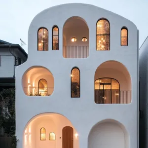Preview of Whimsical White Arched House Brings Fairy Tales to Life