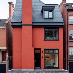 Bold Red Brick Facade with Quirky Chimney