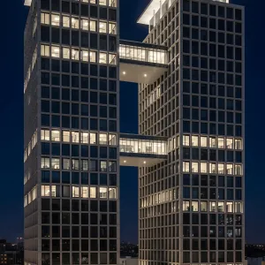 Twin Towers With Skybridges Illuminate the Night
