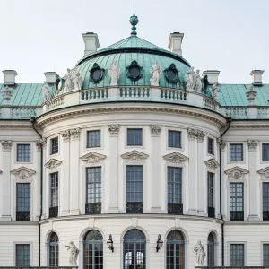 Copper-Crested Rotunda With Regal Statues