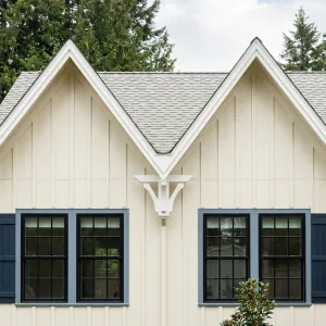 Creamy Gable Cottage With Navy Trim